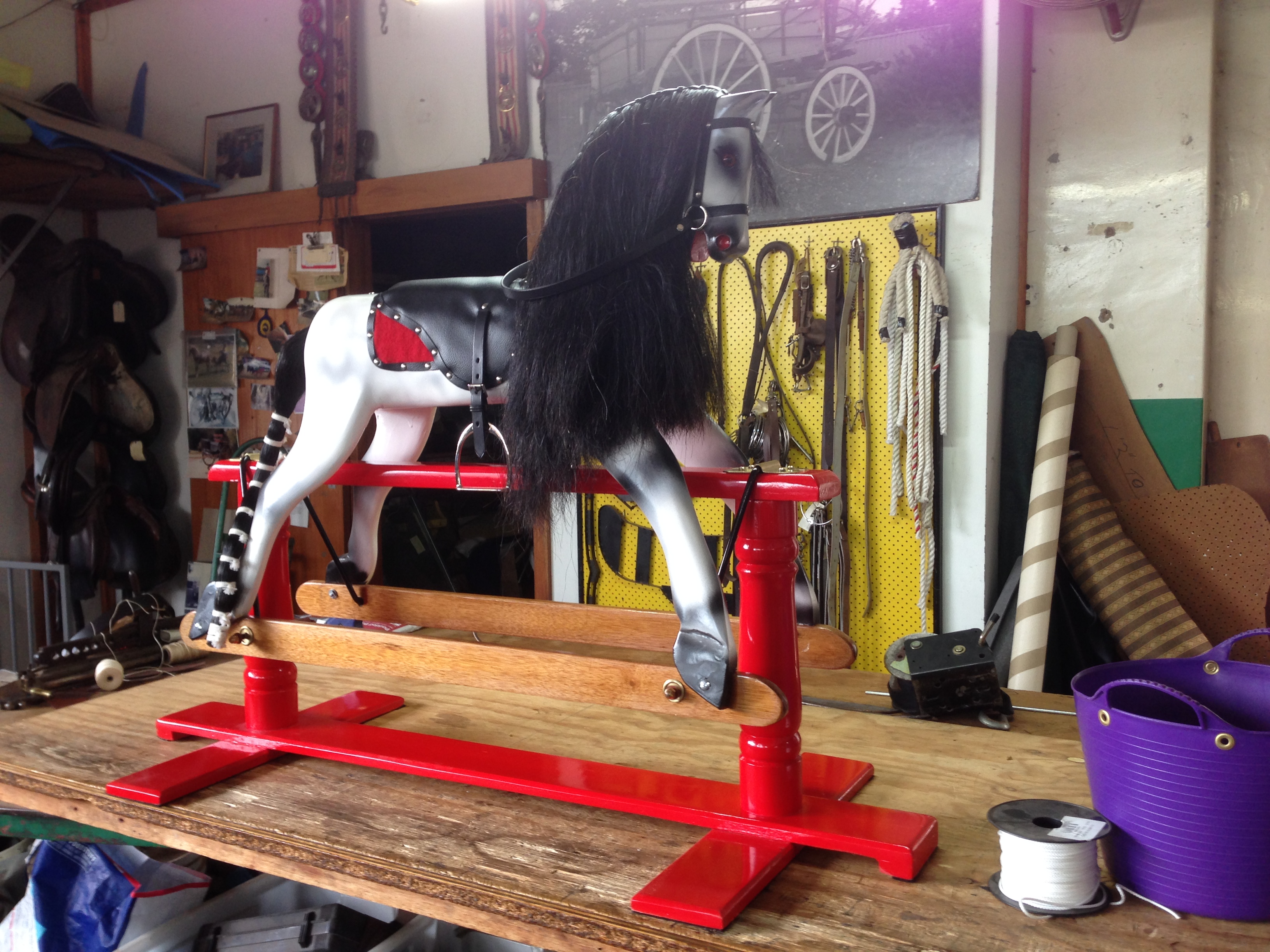 Fully restored rocking horse with new leather saddle